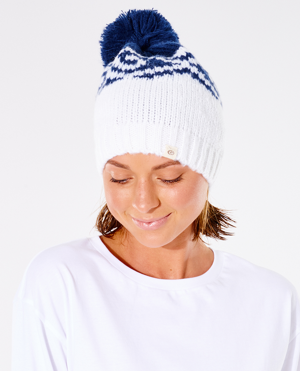 כובע צמר Cosmic Coast Pom-Pom Beanie- Rip Curl